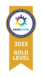 Gold ribbon badge displaying